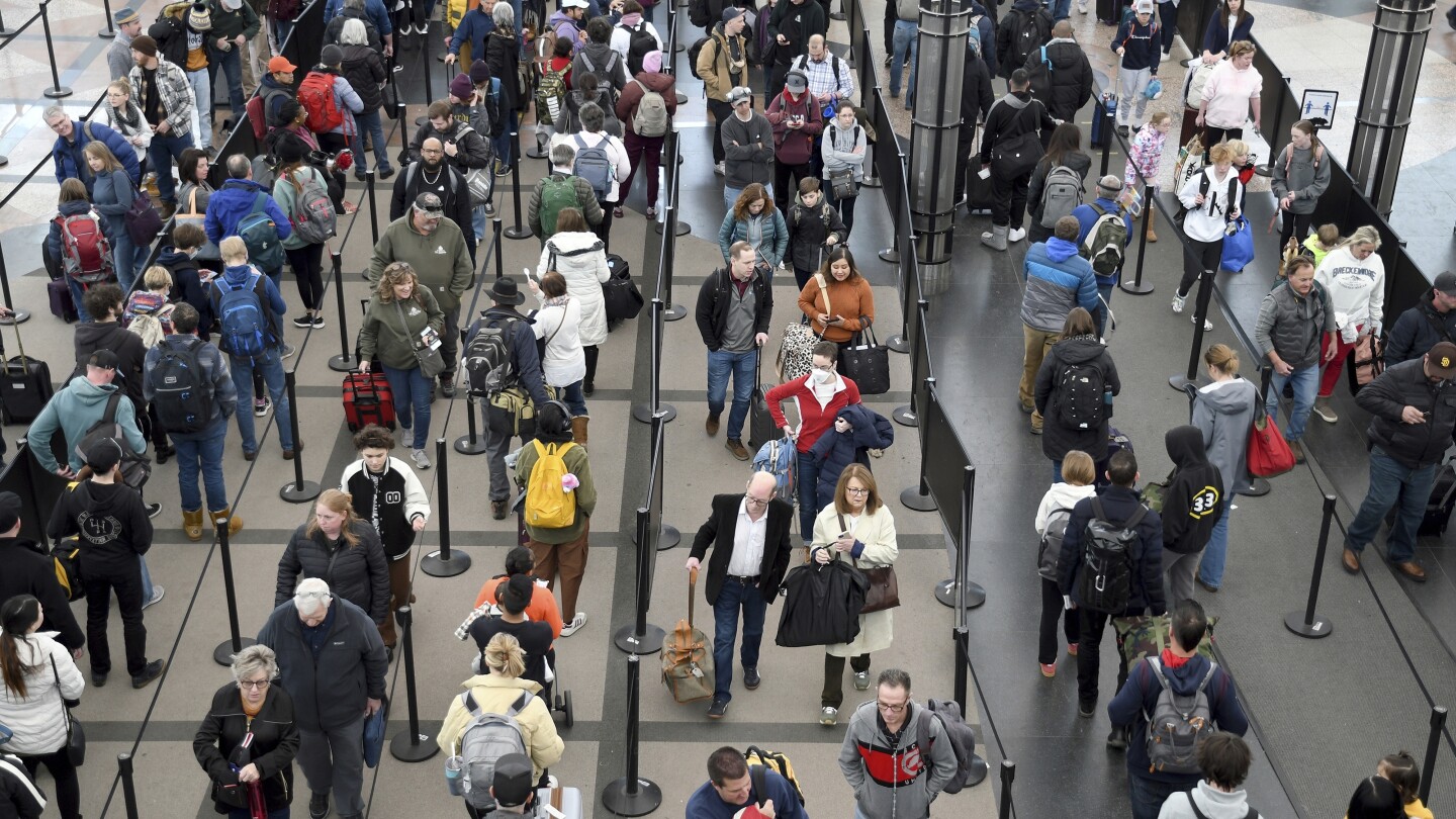 TSA says it screened a record 2.99 million people Sunday, and bigger crowds are on the way
