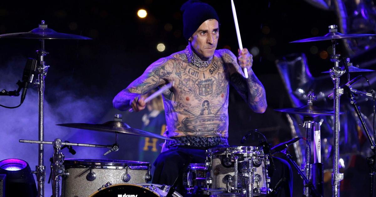 Tommy Hilfiger closes bold show with Travis Barker on drums